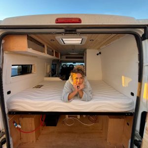 women lying on the standard caravan mattress